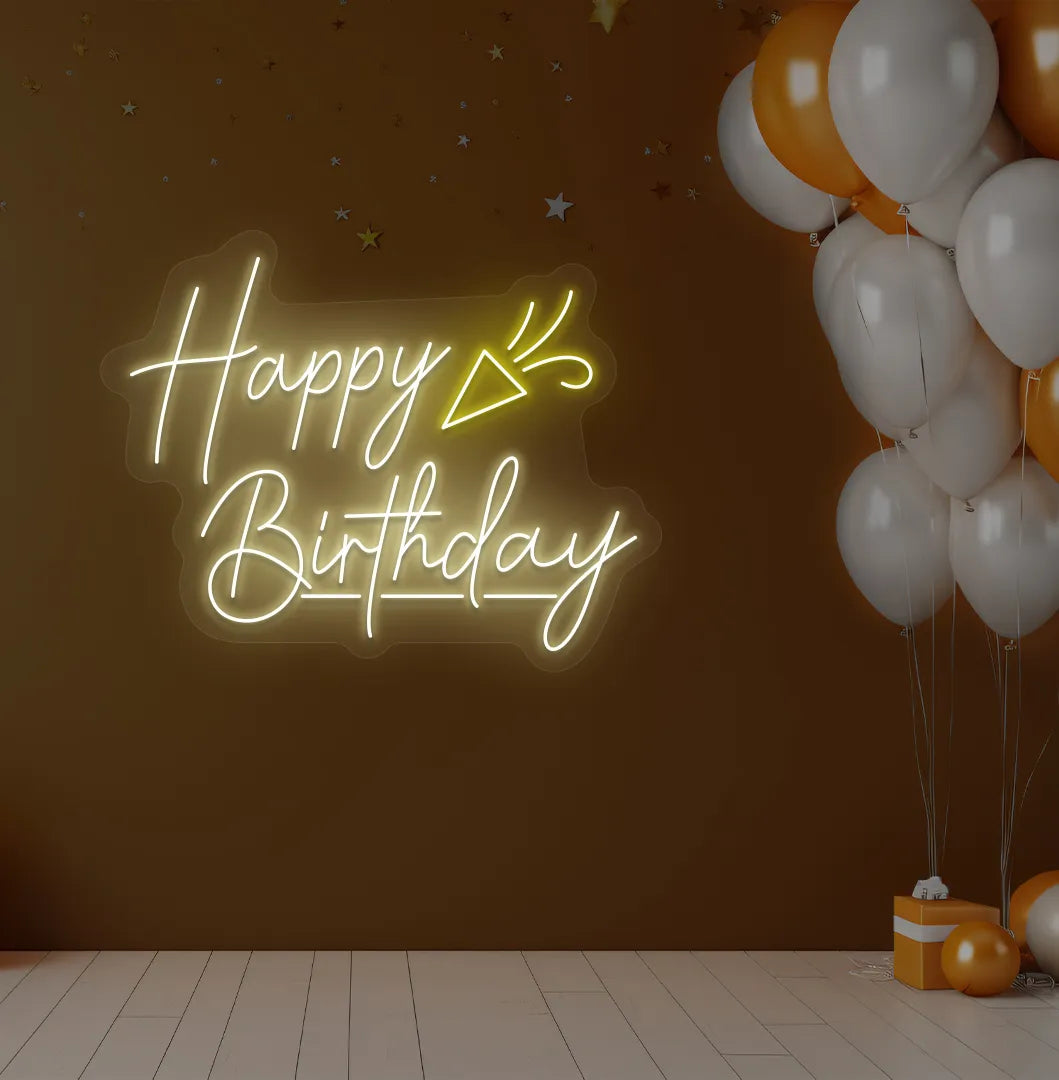 Happy Birthday party popper LED neon sign glowing warm white for celebration backdrop.
