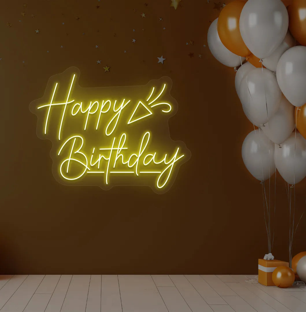 Happy Birthday party popper LED neon sign glowing yellow for celebration backdrop.