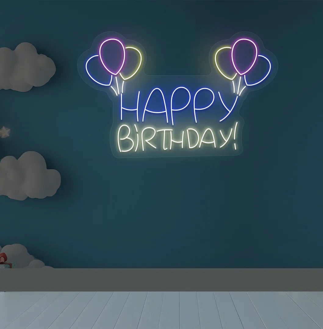Trendy Happy Birthday balloon neon sign mounted on decorative party wall in warm white color.