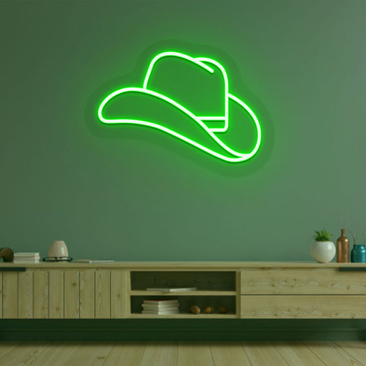 Image of a hat neon sign mounted on living room wall in green color.