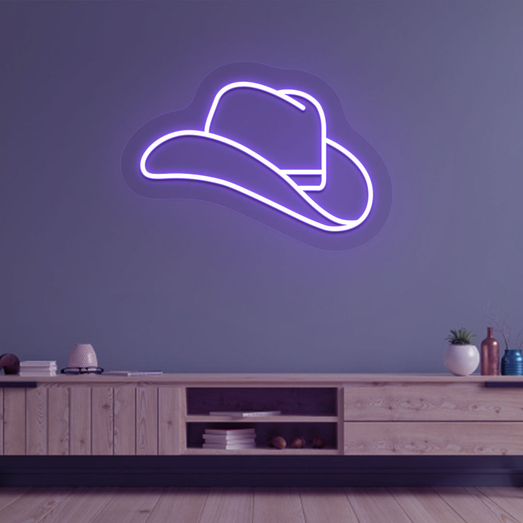 A stylish purple LED hat neon sign is glowing on the living room wall. perfect for wall décor, fashion studios, and bars.