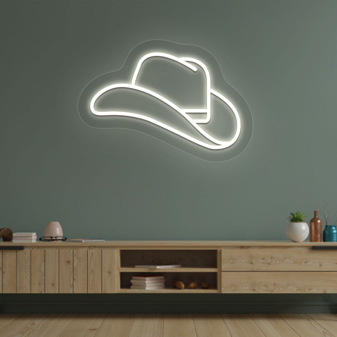 Image of a hat neon sign mounted on living room wall in warm white color.
