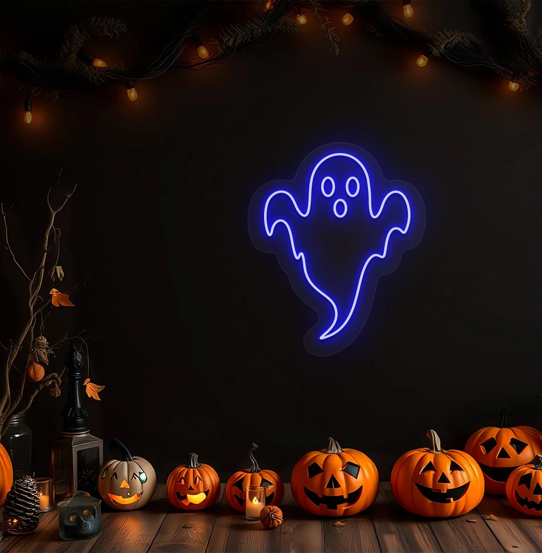 Image of a haunted ghost neon sign above pumpkins on Halloween wall in blue color.