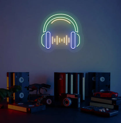 Modern aesthetic room with headphone neon sign glowing green.