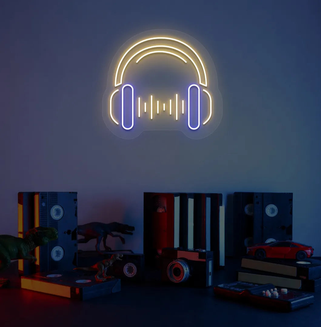 Modern aesthetic room with headphone neon sign glowing orange.