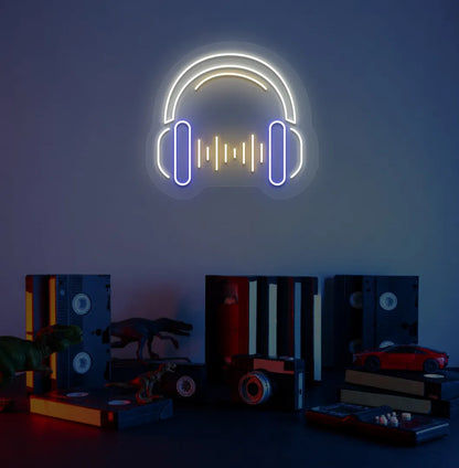 Modern aesthetic room with headphone neon sign glowing warm white.