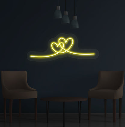 Aesthetic wall with a heart neon sign glowing yellow. Perfect for bedrooms, living rooms, cafés, events, and party setups.