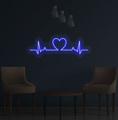 Image of a heartbeat LED neon sign glowing on a wall in blue color.