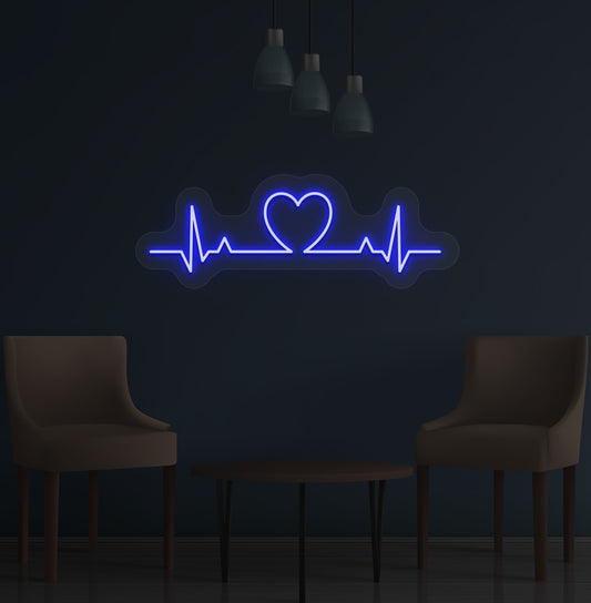 Image of a heartbeat LED neon sign glowing on a wall in blue color.