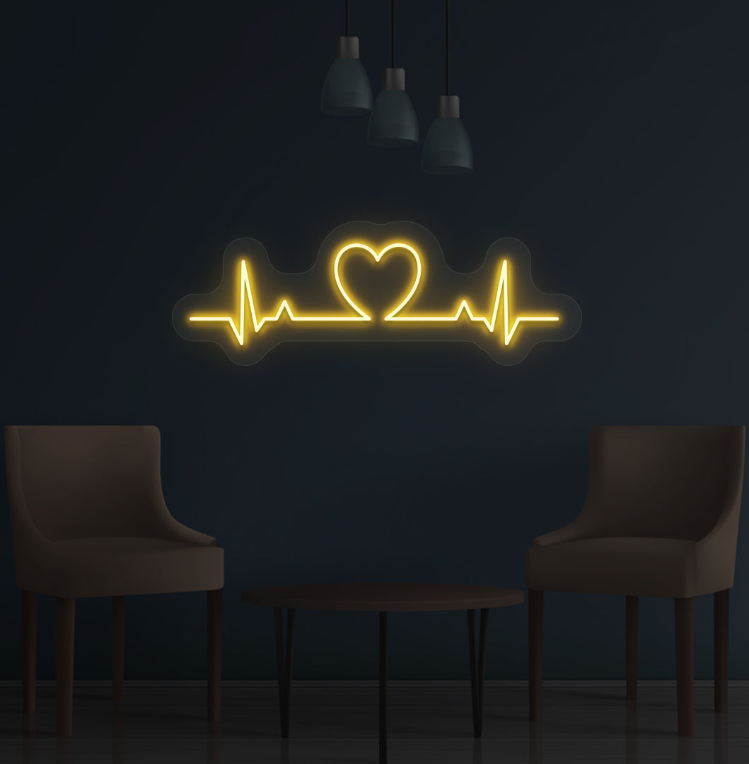 Stylish orange LED heartbeat neon sign glowing on wall.