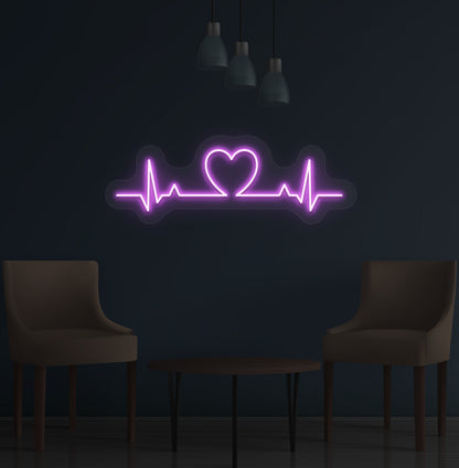 Stylish purple LED heartbeat neon sign glowing on wall.