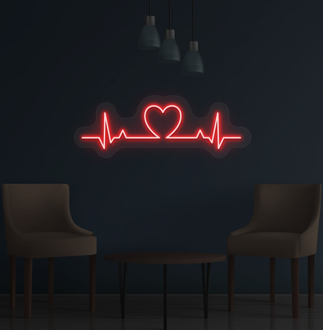 Image of a heartbeat LED neon sign glowing on a wall in red color.