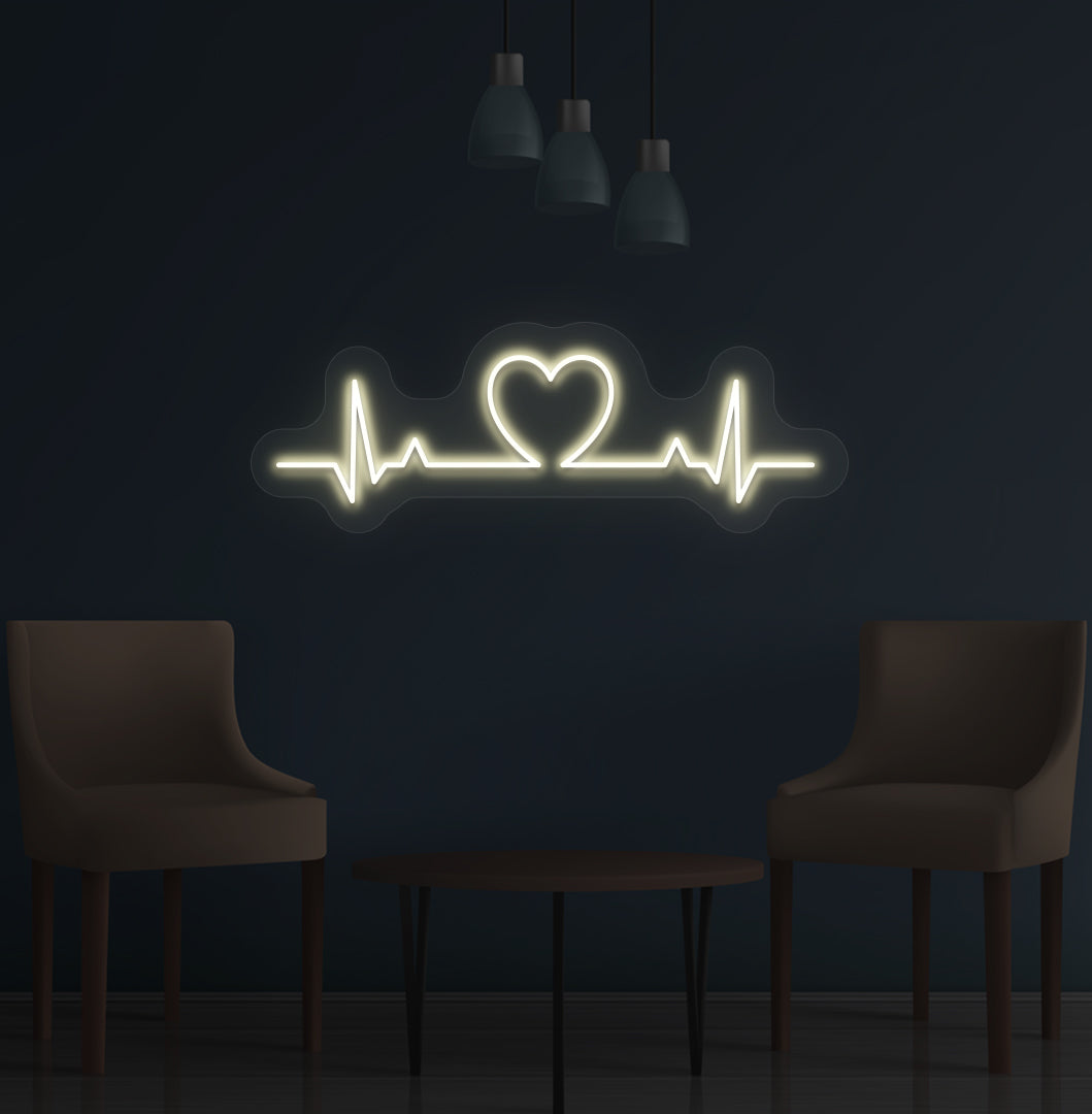 Stylish warm white LED heartbeat neon sign glowing on wall.
