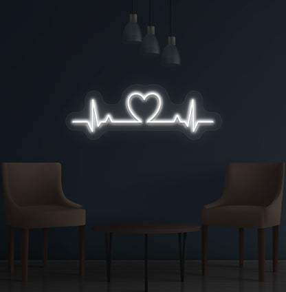 Image of a heartbeat LED neon sign glowing on a wall in white color.