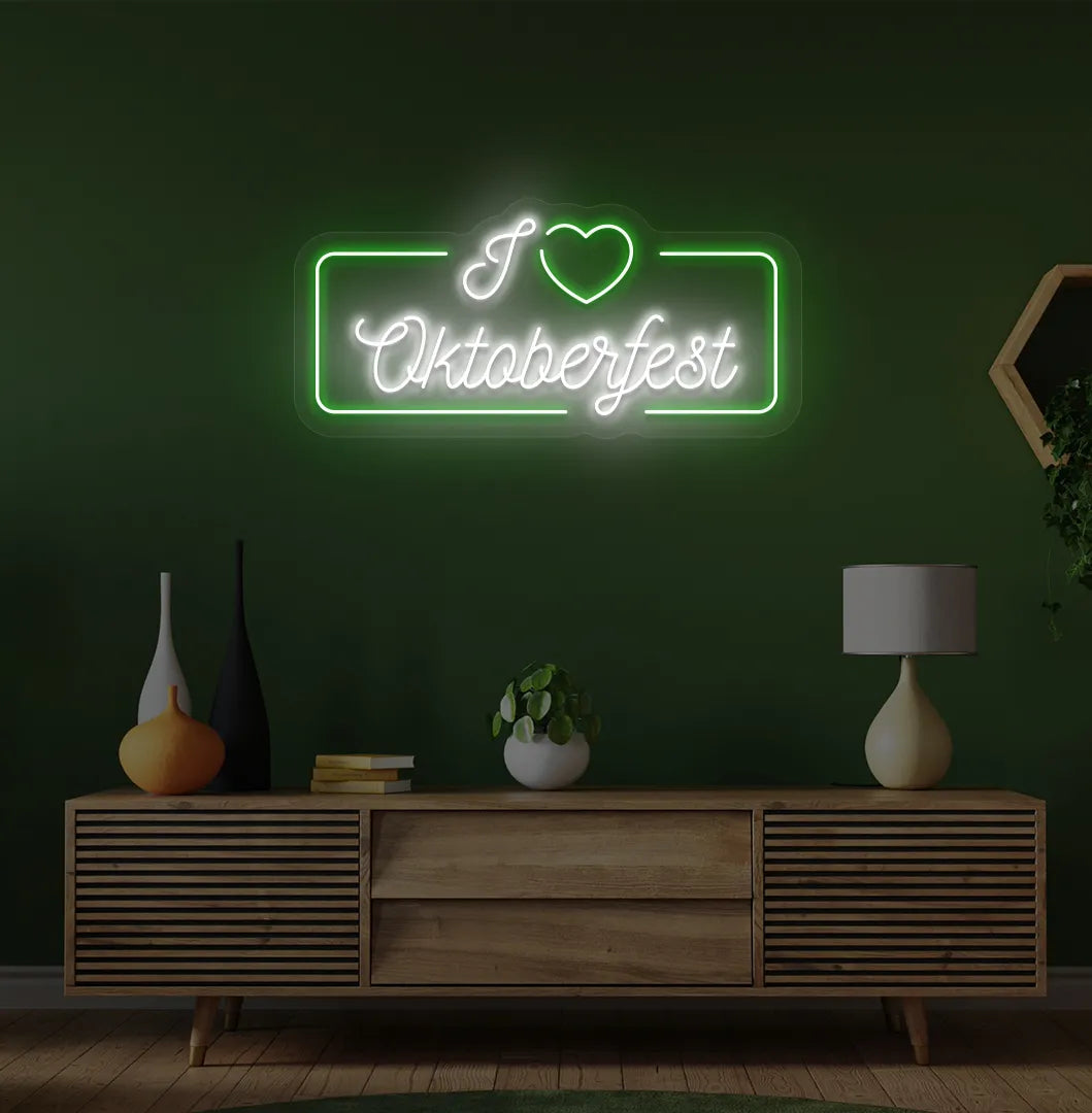 I Love Oktoberfest Neon Sign illuminated in green and mounted on a wall