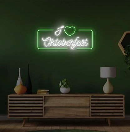 I Love Oktoberfest Neon Sign illuminated in green and mounted on a wall