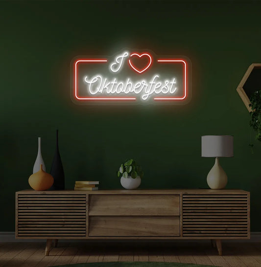 I Love Oktoberfest LED neon sign with red glow mounted on wall.