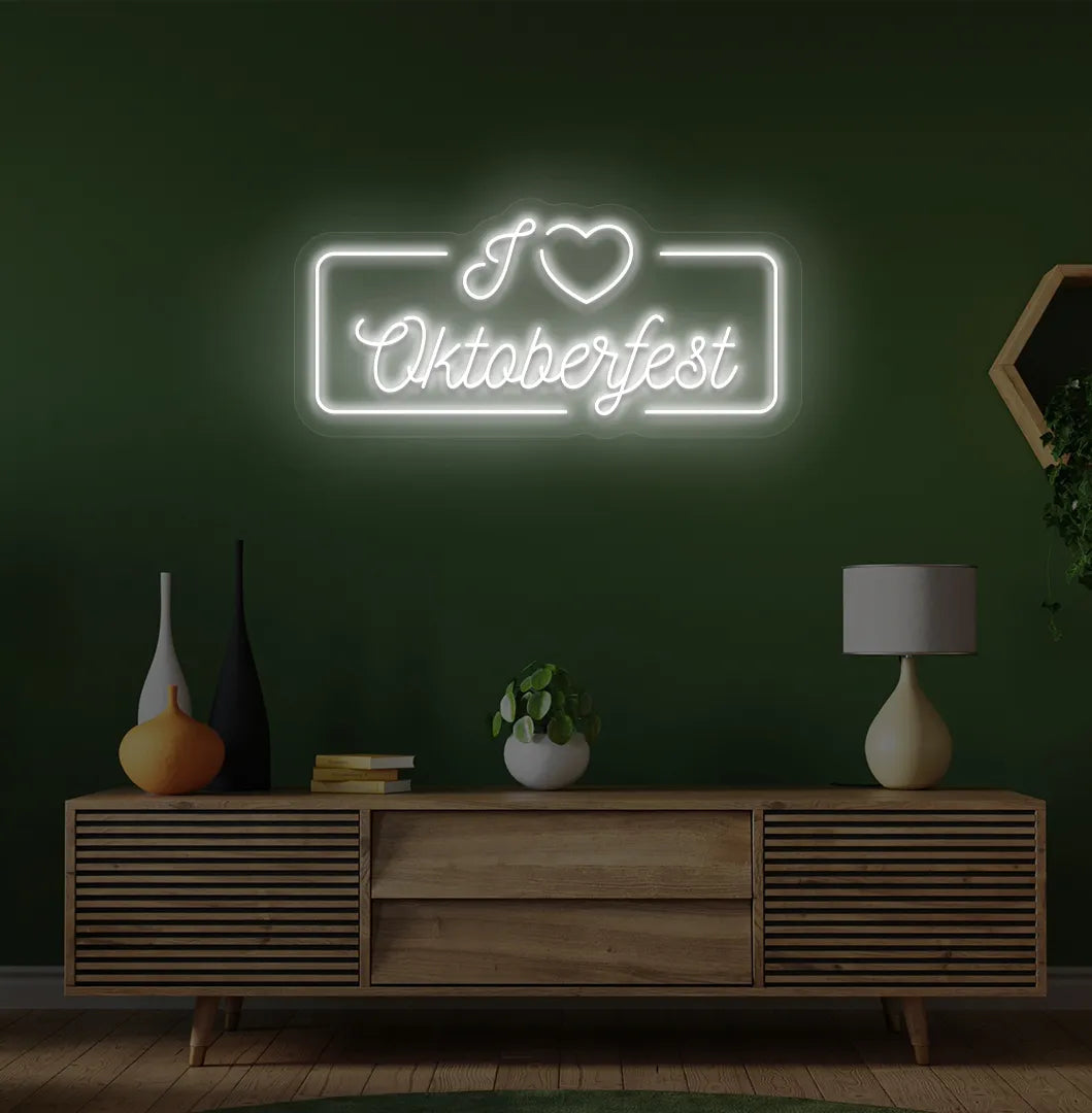 I Love Oktoberfest LED neon sign with white glow mounted on wall.