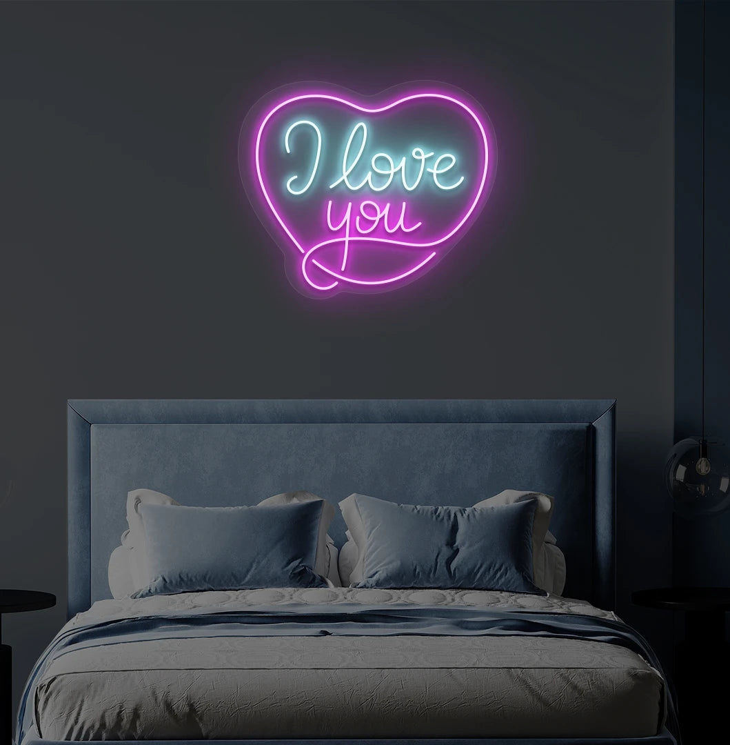 Modern bedroom wall with I love you neon sign in heart shape glowing ice blue.