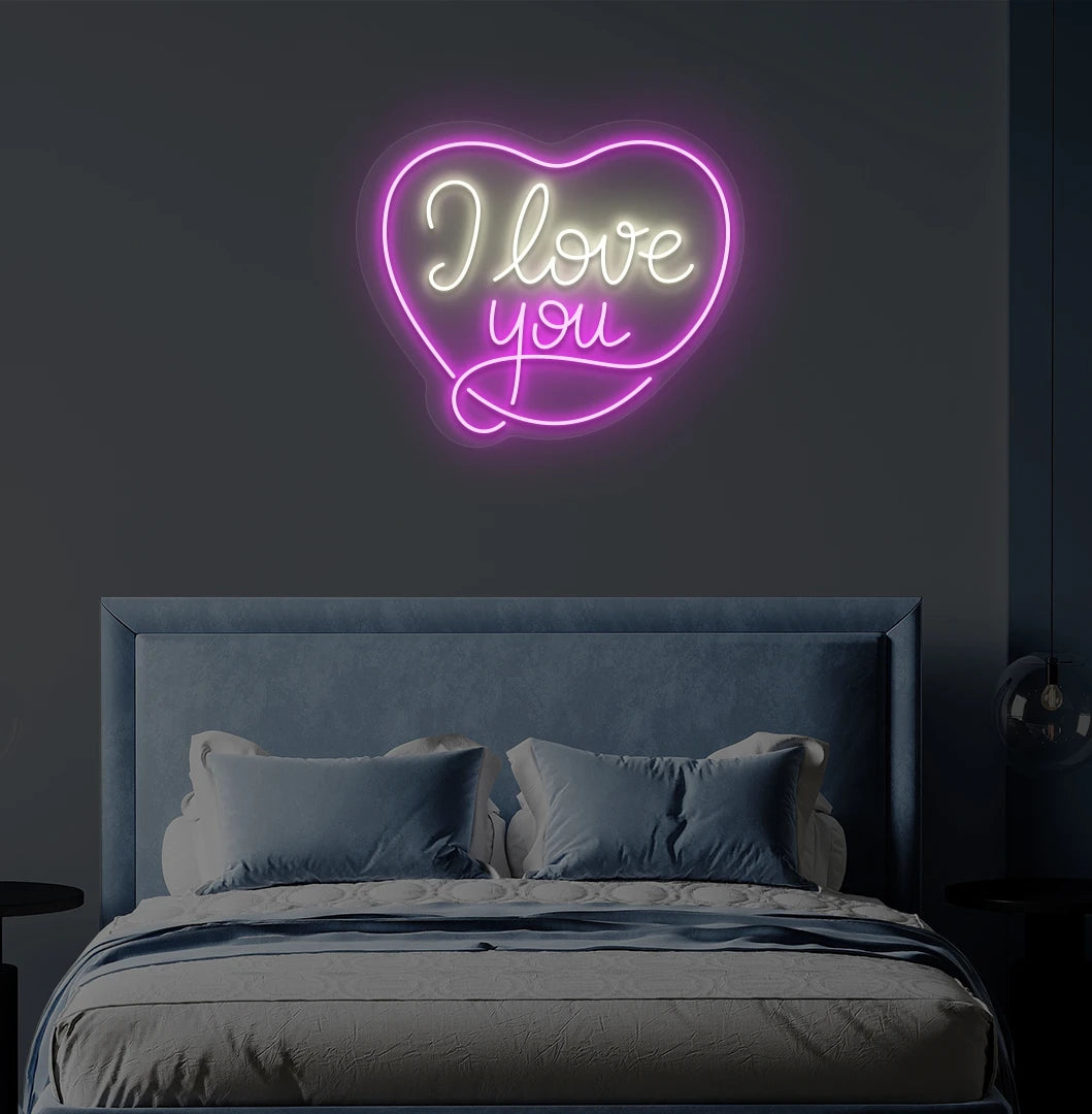 Modern bedroom wall with I love you neon sign in heart shape glowing warm white.