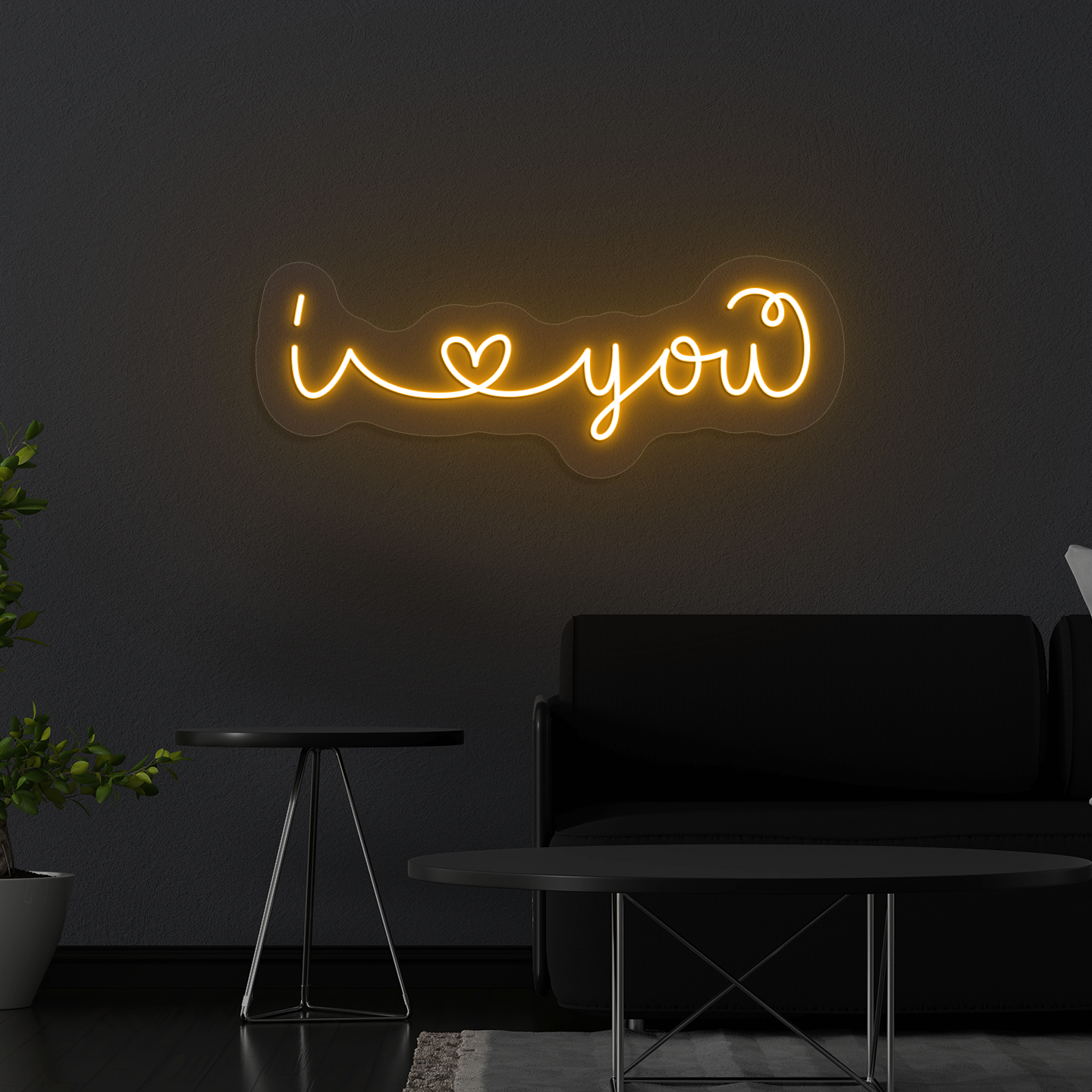 Stylish "I love you" LED neon mounted on wall in orange.
