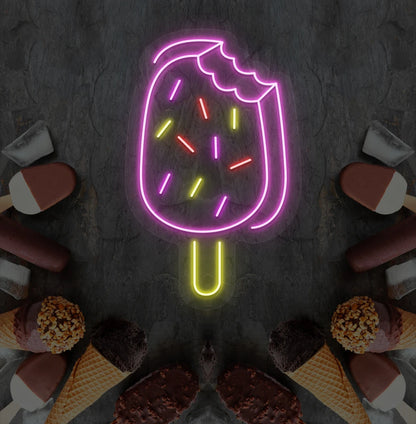 Image of an ice cream bar neon sign mounted on ice cream theme wall in pink color.