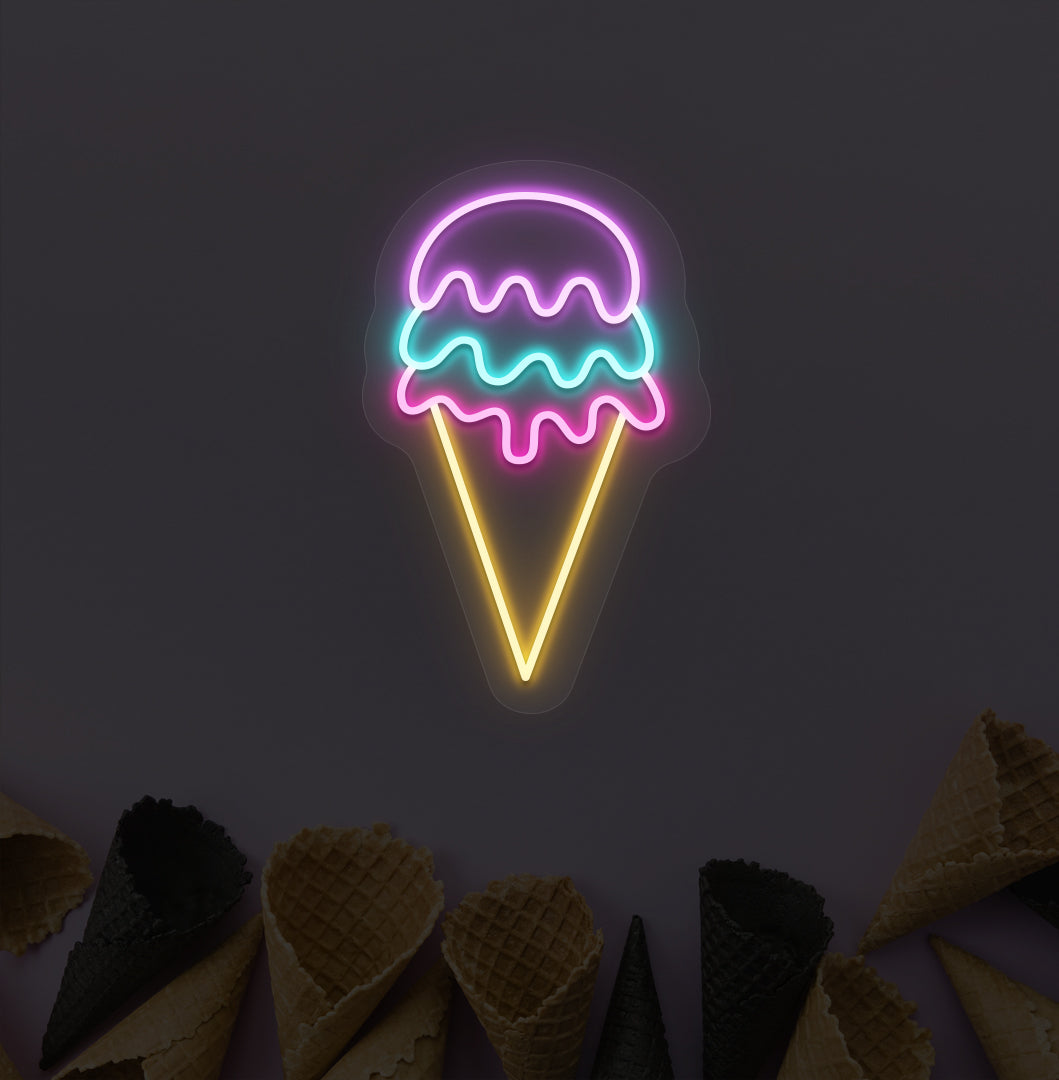 A colorful ice cream LED neon sign with purple, yellow, and green glowing on a cone wallpaper wall. For ice cream parlors, food outlets & kids' rooms.