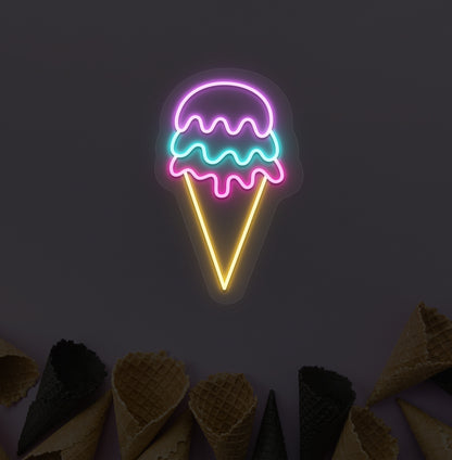 A colorful ice cream LED neon sign with purple, yellow, and green glowing on a cone wallpaper wall. For ice cream parlors, food outlets & kids' rooms.