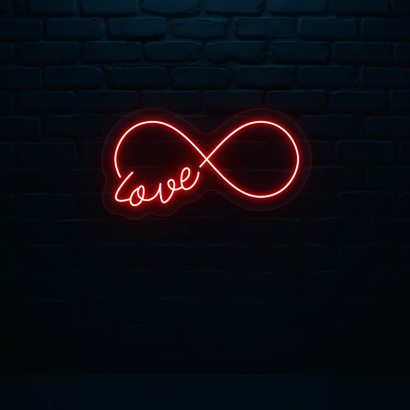 Image of a romantic "infinity love" LED neon sign glowing on wall in red color.