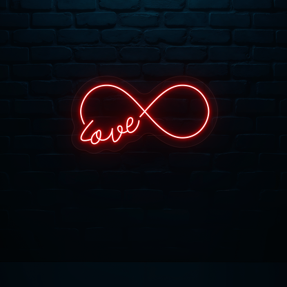 Image of a romantic "infinity love" LED neon sign glowing on wall in red color.