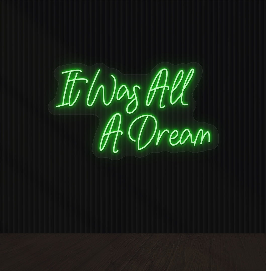Stylish green LED "It was all a dream" neon sign mounted on dark wall. Perfect for bedrooms, gaming, creative studios, and aesthetic interiors.