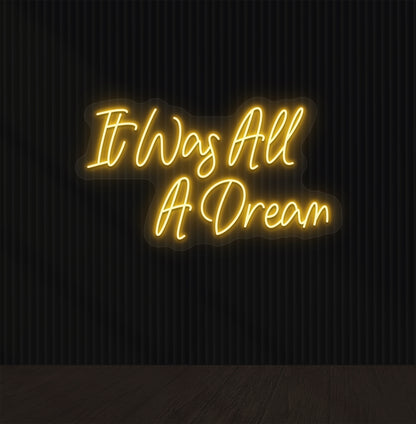 Stylish orange LED "It was all a dream" neon sign mounted on dark wall. Perfect for bedrooms, gaming, creative studios, and aesthetic interiors.