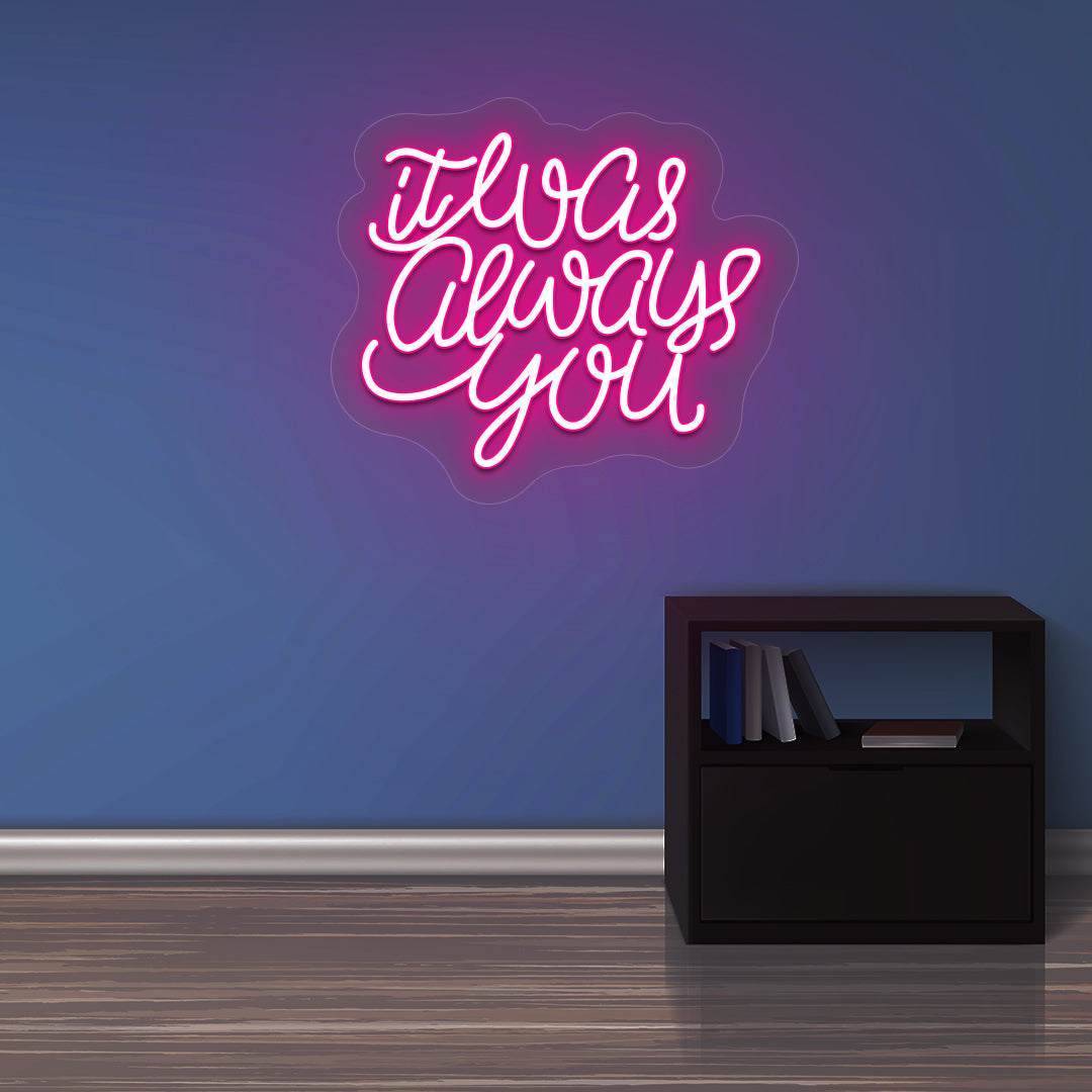 Aesthetic wall with "it was always you" pink LED neon sign. 