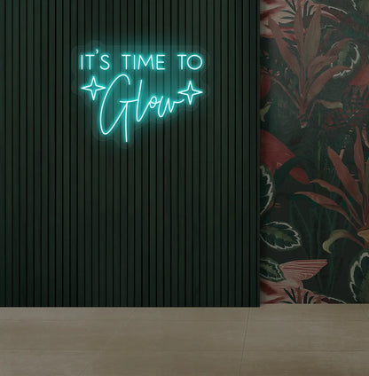 Image of an aesthetic salon wall with it’s time to glow neon sign glowing ice blue.