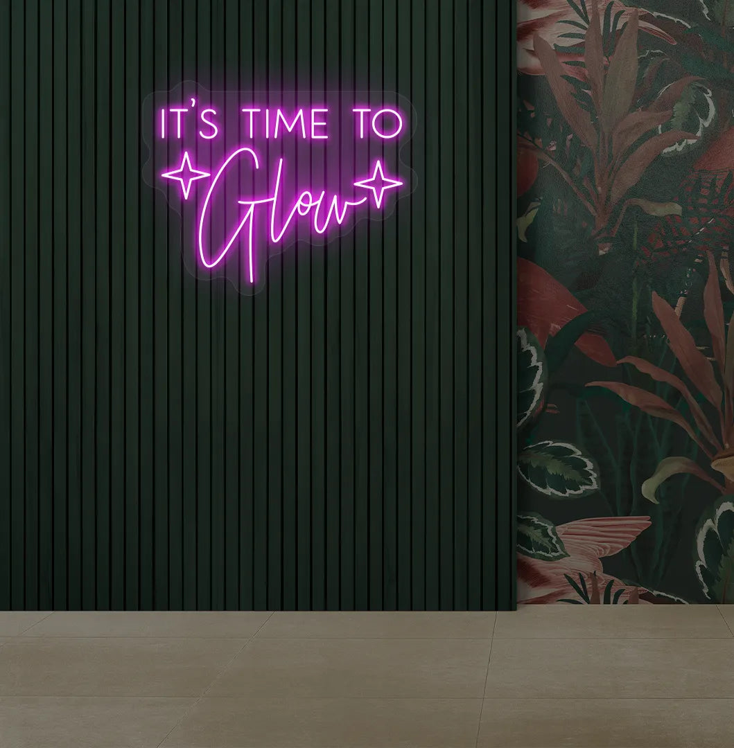 Image of an aesthetic salon wall with it’s time to glow neon sign glowing pink.