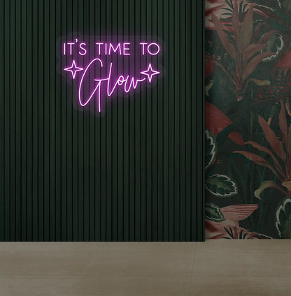 Modern salon aesthetic wall with it’s time to glow neon sign glowing purple.