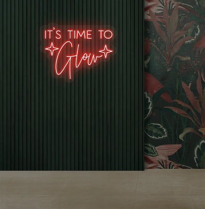 Image of an aesthetic salon wall with it’s time to glow neon sign glowing red.