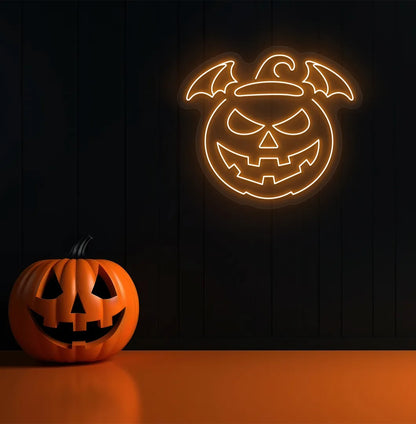 Jack O' Lantern orange LED Neon Sign creating a spooky glow on a themed wall