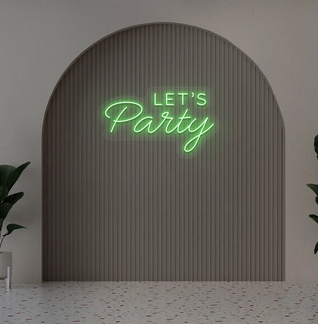 Image of a festive Let's Party green neon sign glowing on decorative wall.