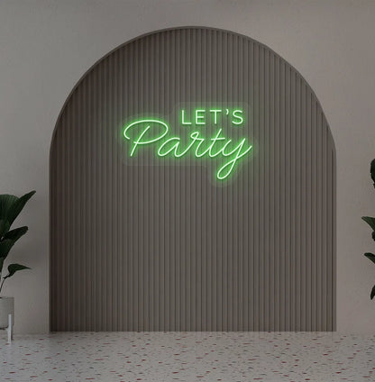 Image of a festive Let's Party green neon sign glowing on decorative wall.