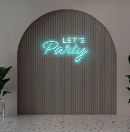 Party-themed Let's Party neon sign mounted on modern event wall in ice blue color.
