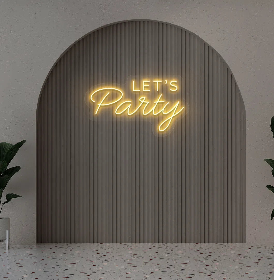 Image of a festive Let's Party orange neon sign glowing on decorative wall.