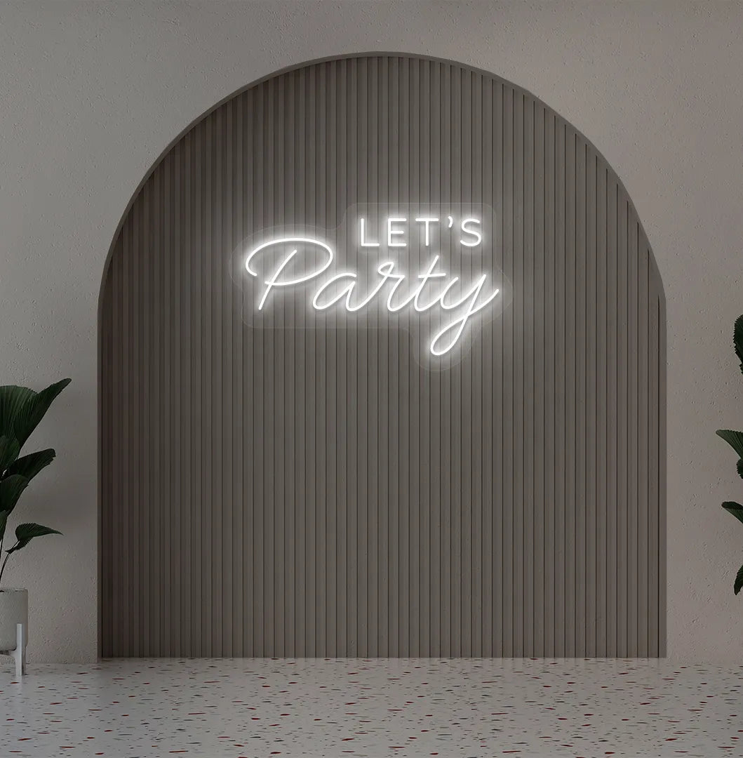 Party-themed Let's Party neon sign mounted on modern event wall in white color.