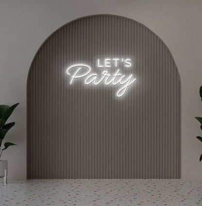 Party-themed Let's Party neon sign mounted on modern event wall in white color.