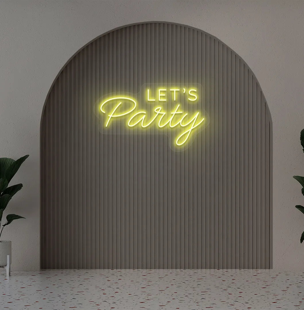 Image of a festive Let's Party yellow neon sign glowing on decorative wall.