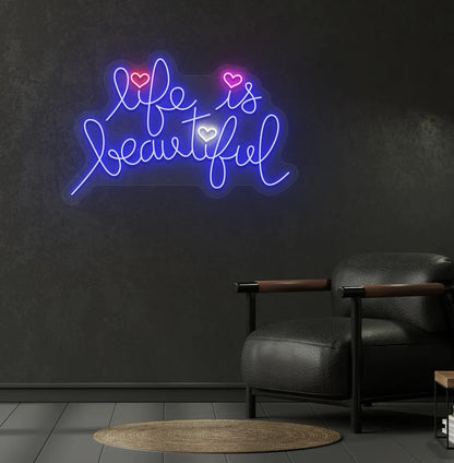 Inspirational Life Is Beautiful neon sign glowing blue on aesthetic wall.