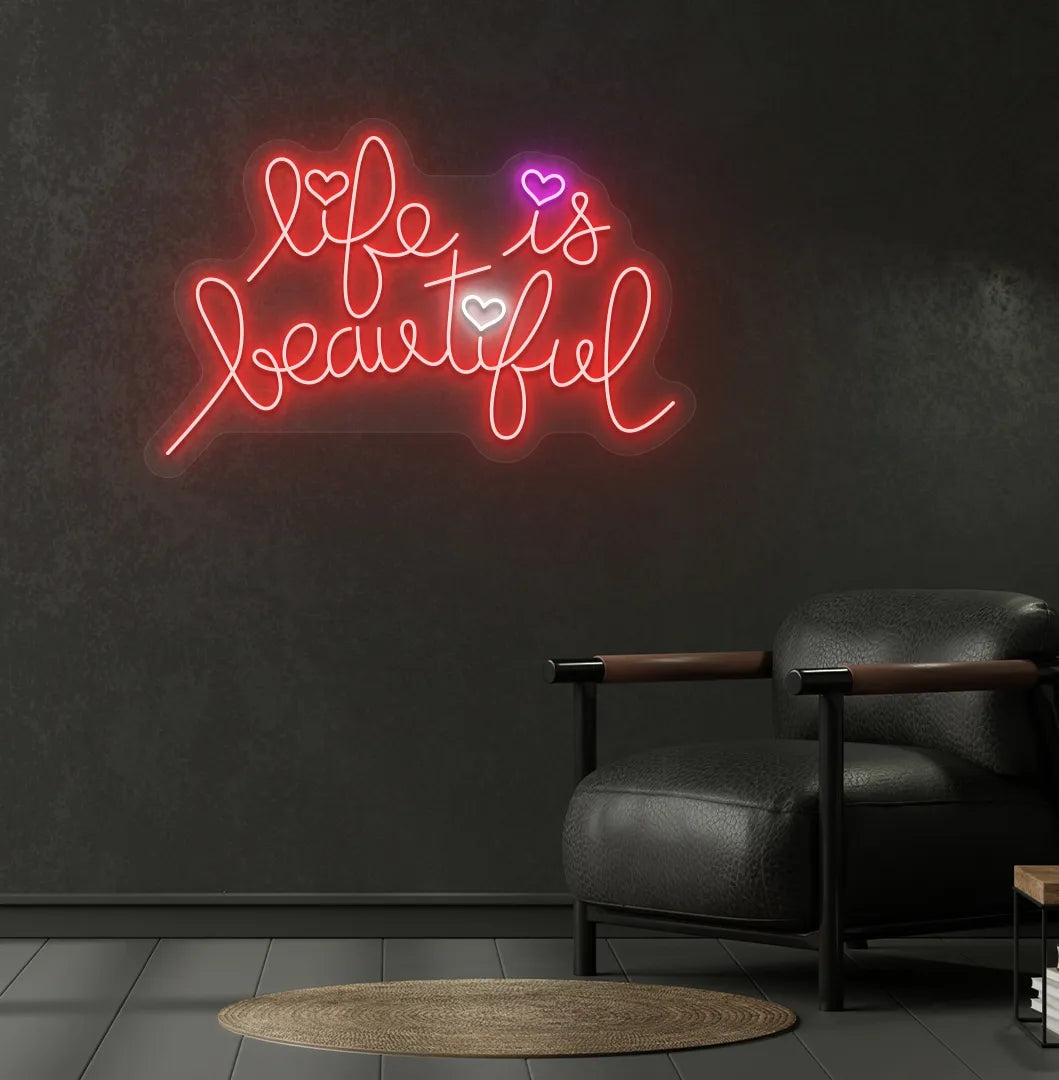 Inspirational Life Is Beautiful neon sign glowing red on aesthetic wall.