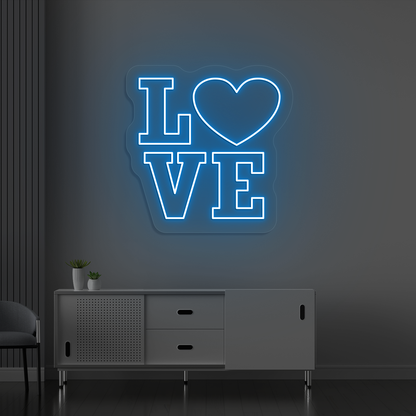 Image of a love neon sign glowing on a wall in ice blue color.