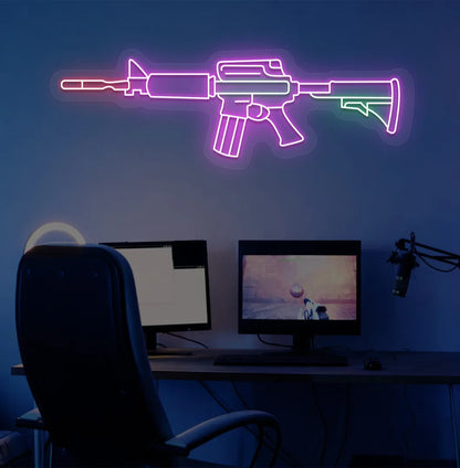 Image of a M416 gaming gun neon sign in pink color mounted on gaming room wall.