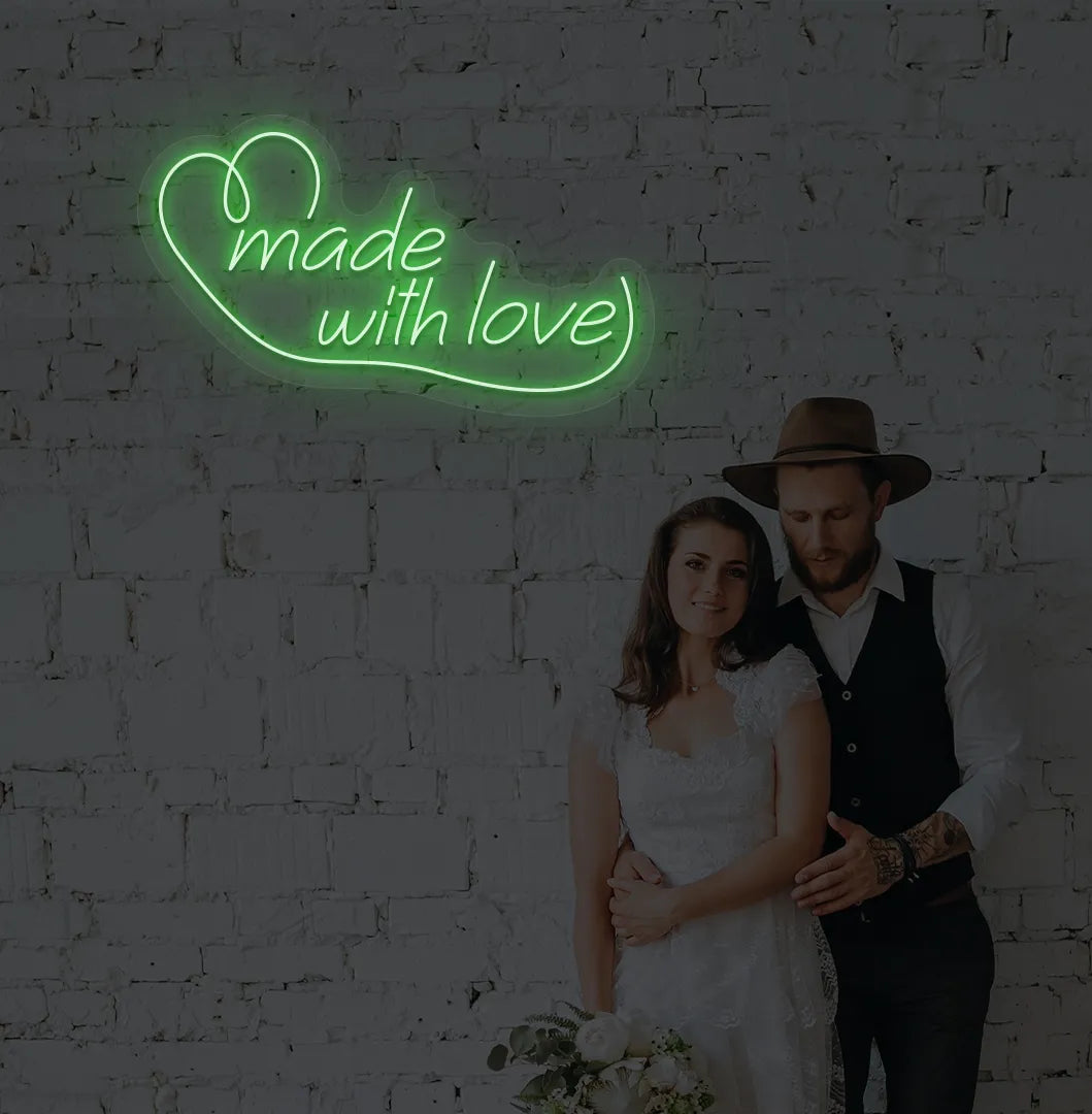 Bright green made with Love neon sign for wedding backdrop decoration.